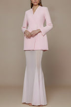 Back view of set showing blazer structure and skirt silhouette