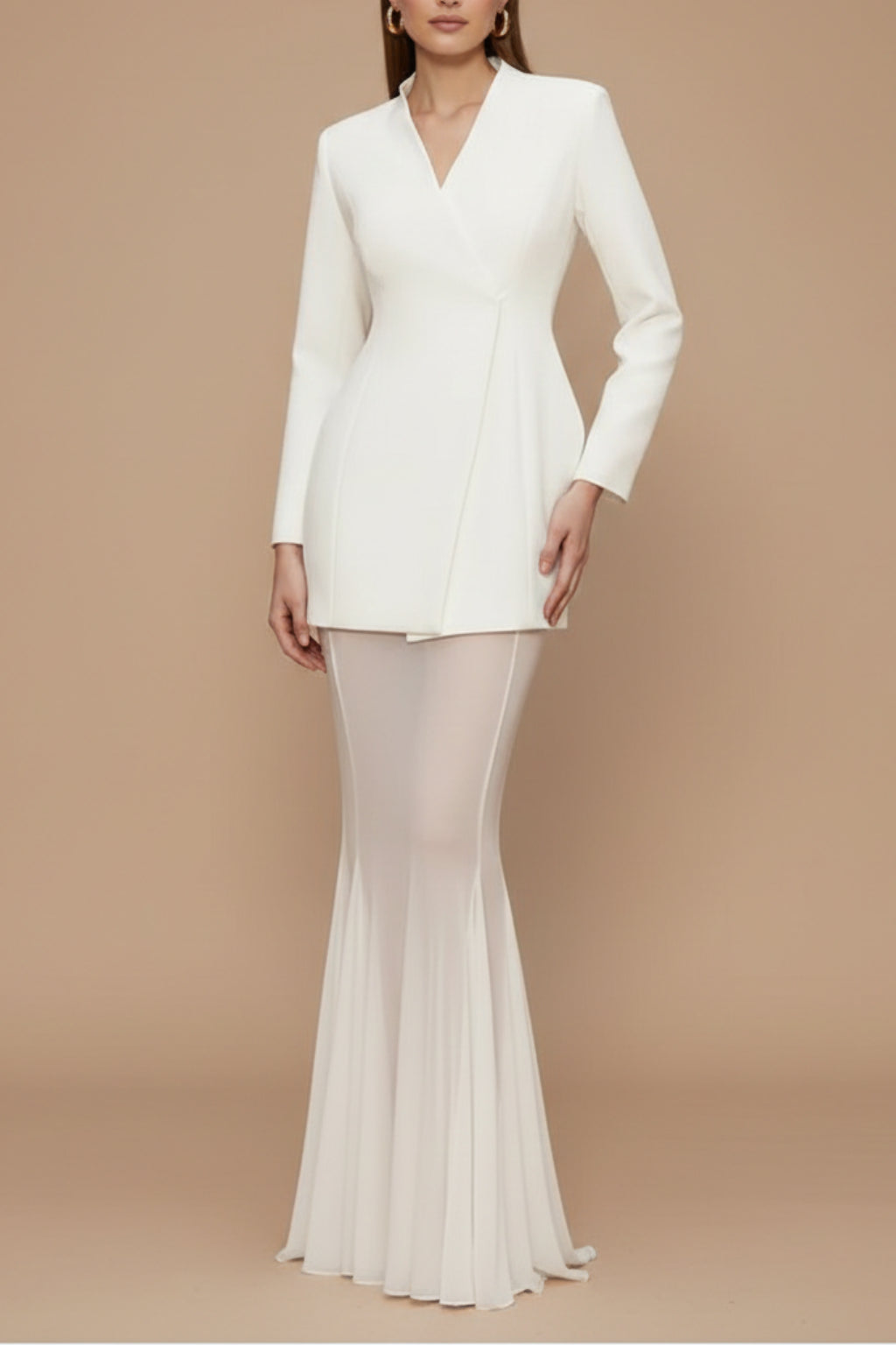 Model wearing blazer and skirt set, side profile pose