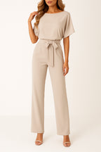 Close-up of self-tie belt detail cinching waist
