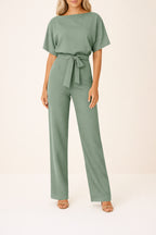 Back view of jumpsuit showing neckline and sleeve fit