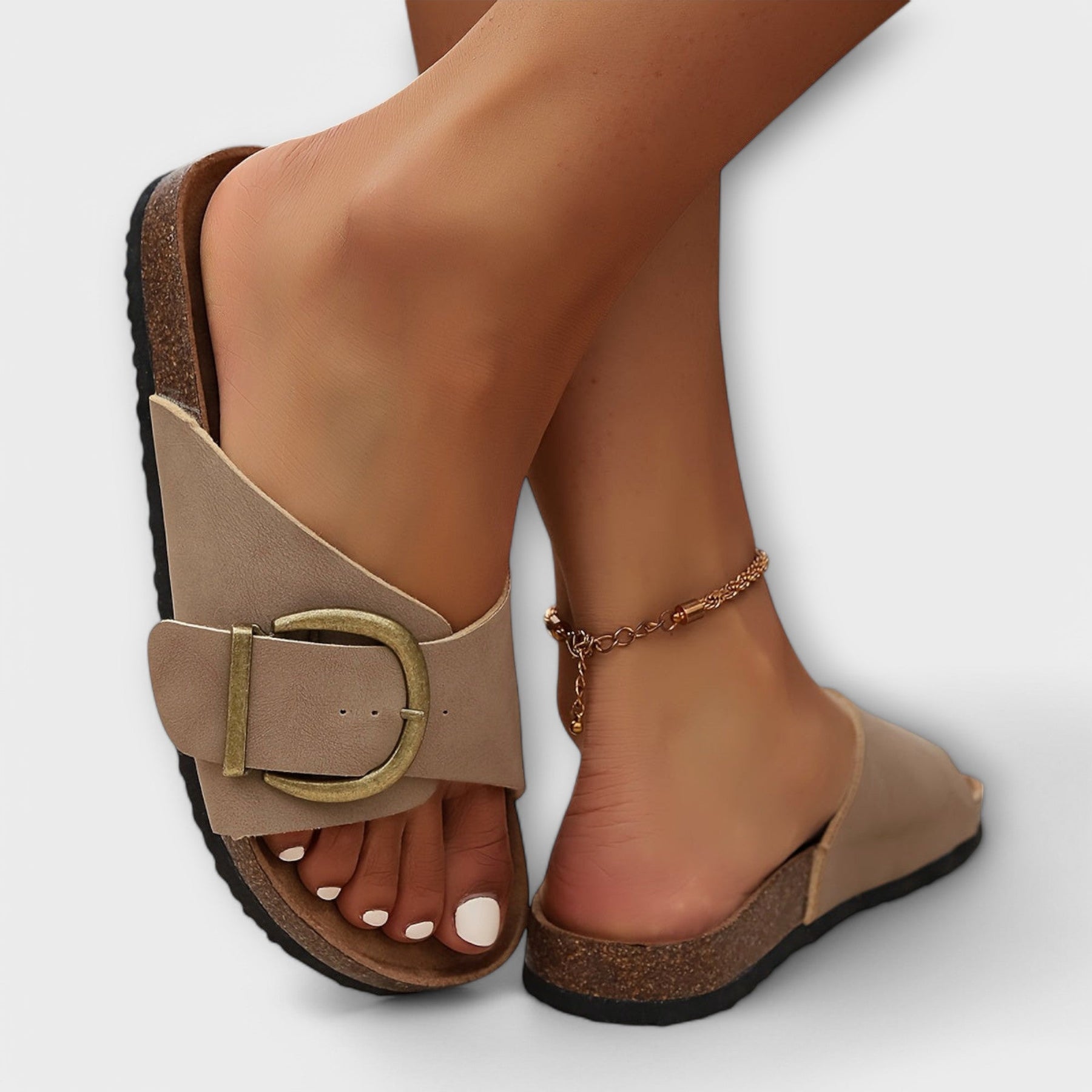 Model wearing sandals, walking pose