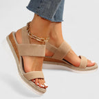 Woman wearing black platform sandals, front view standing pose