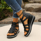 Gladiator sandal worn on foot, side profile