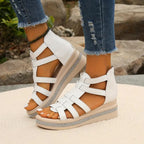 Strappy band details across foot and ankle