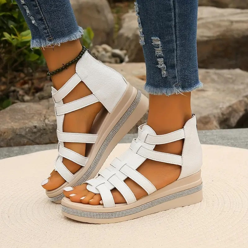 Strappy band details across foot and ankle