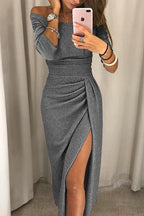 Side angle showing wrap-style skirt and dramatic thigh split