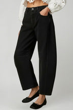 Side view of high waist wide leg jeans on model