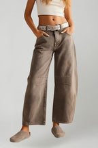 Black wide leg jeans hem and ankle cut detail