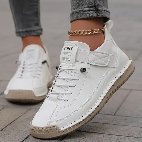 Top view of trainer showing generous toe box and stitching detail