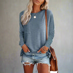 Model wearing relaxed fit top, rear view showing back fit