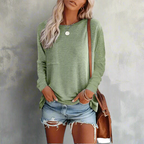 Model in relaxed fit top, three-quarter angle pose