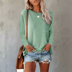 Flat lay of relaxed fit top showing full silhouette