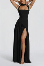 Back view of black maxi dress showing pleated skirt and slit