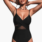 Close-up detail of sheer mesh panels across midriff