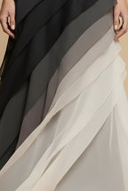 Back view of ombre maxi dress showing diagonal gradient and chiffon panel layers