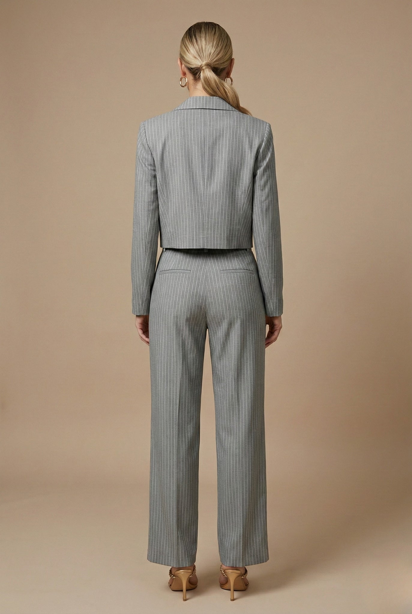 High-waisted wide leg trousers with vertical pinstripe pattern detail