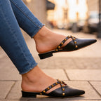 Woman in casual outfit wearing studded mules for everyday styling