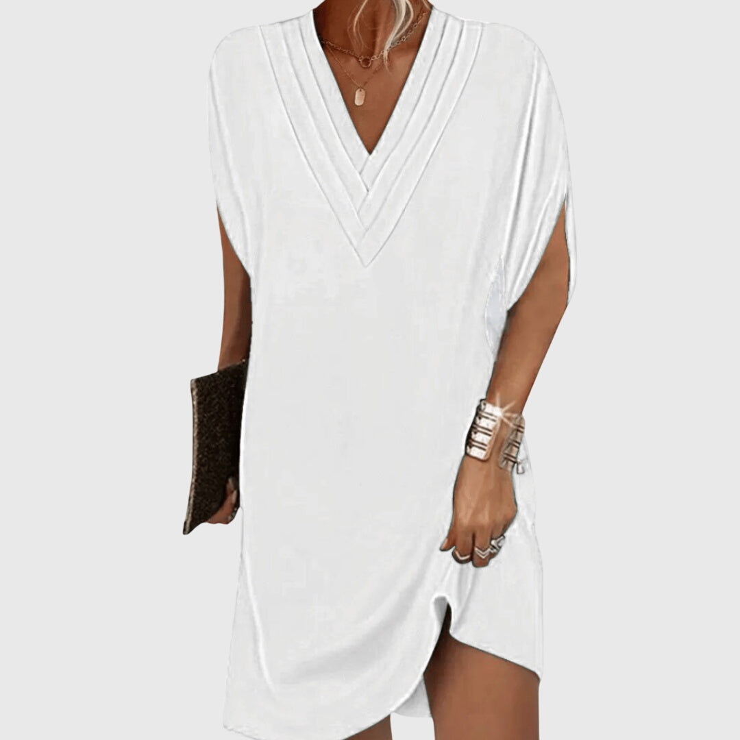 Close-up of split hem and relaxed silhouette detail