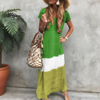 Model in colourblock dress posing with relaxed bohemian styling