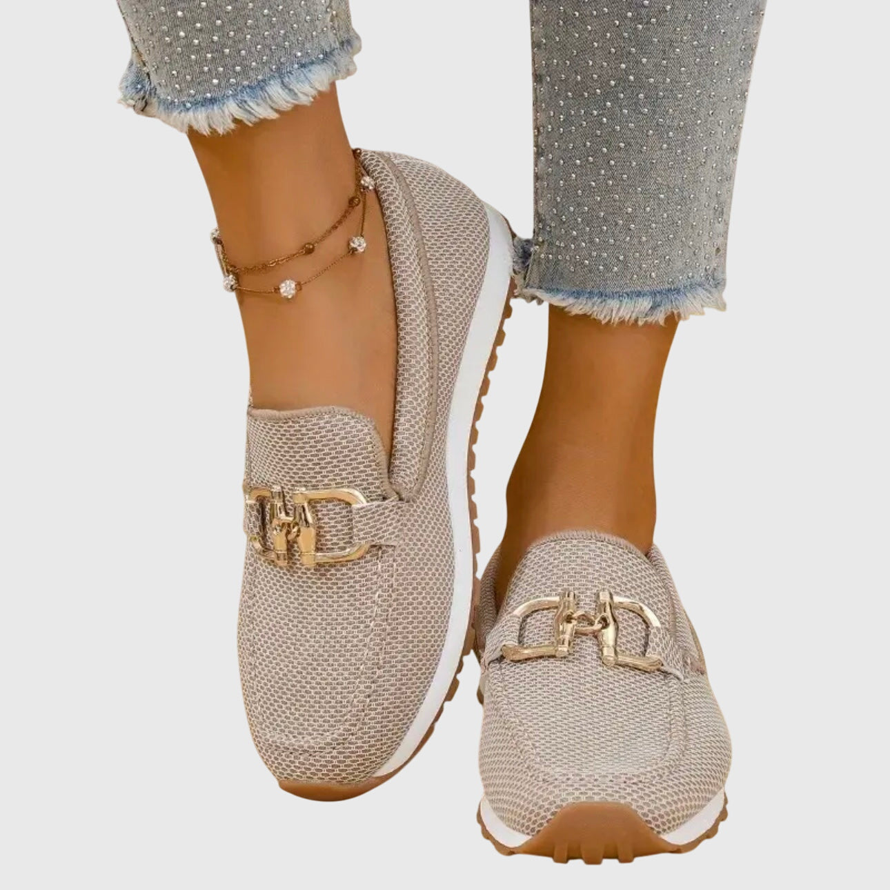 Woman walking in denim loafers, casual lifestyle shot