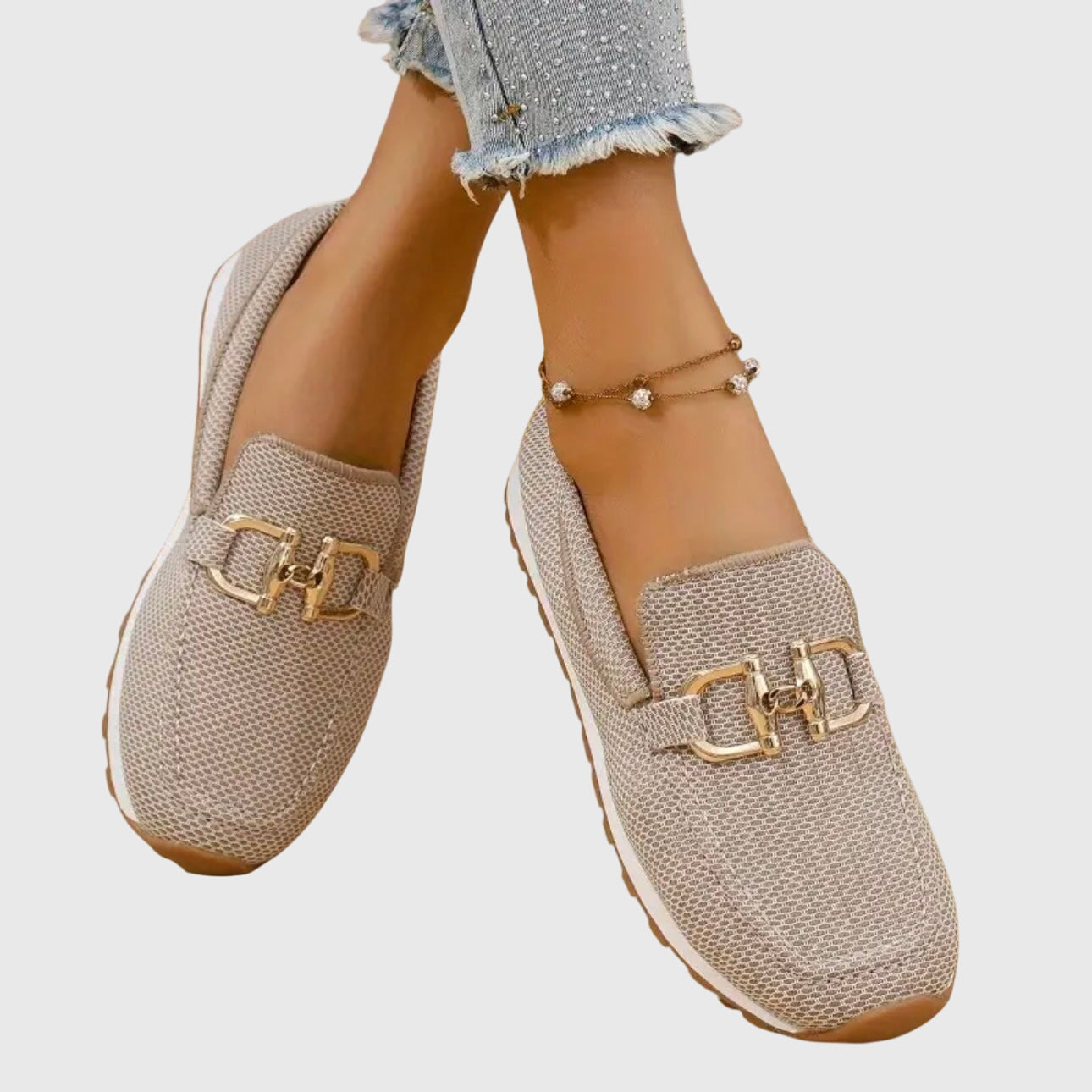 Side profile of denim loafer showing curved silhouette and midsole