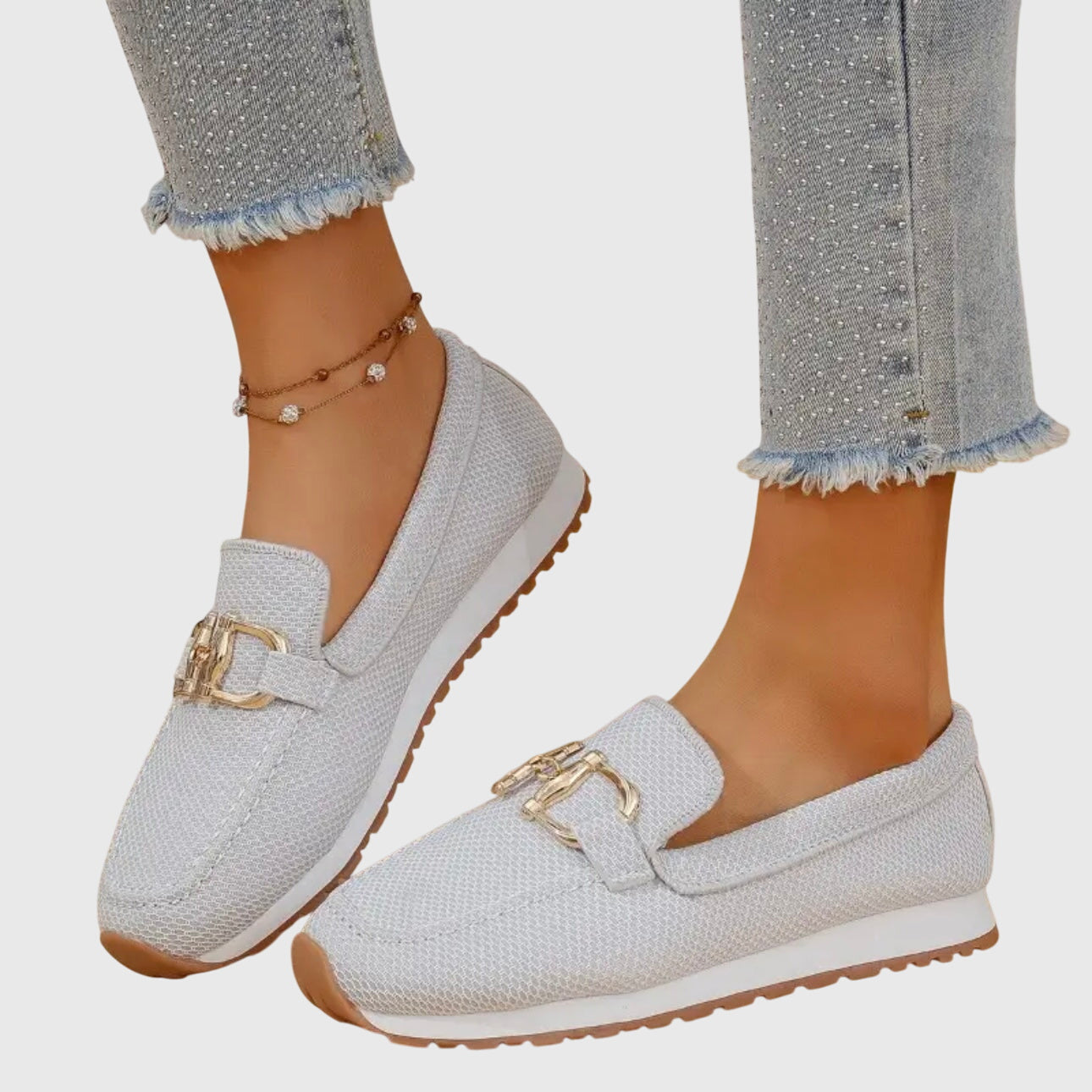 Rear view of denim loafer showing heel construction