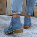 Walking pose wearing denim ankle boot