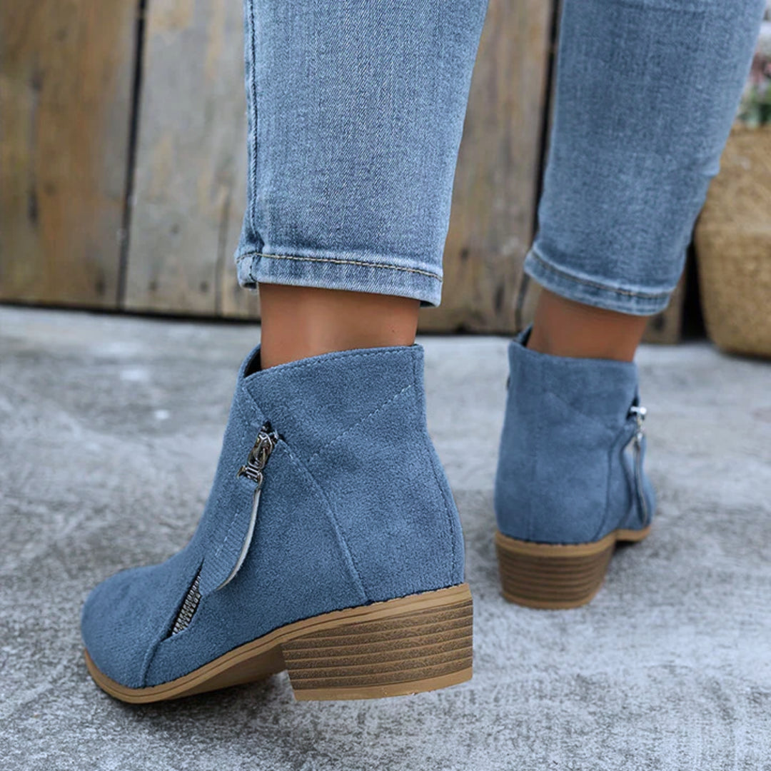 Walking pose wearing denim ankle boot