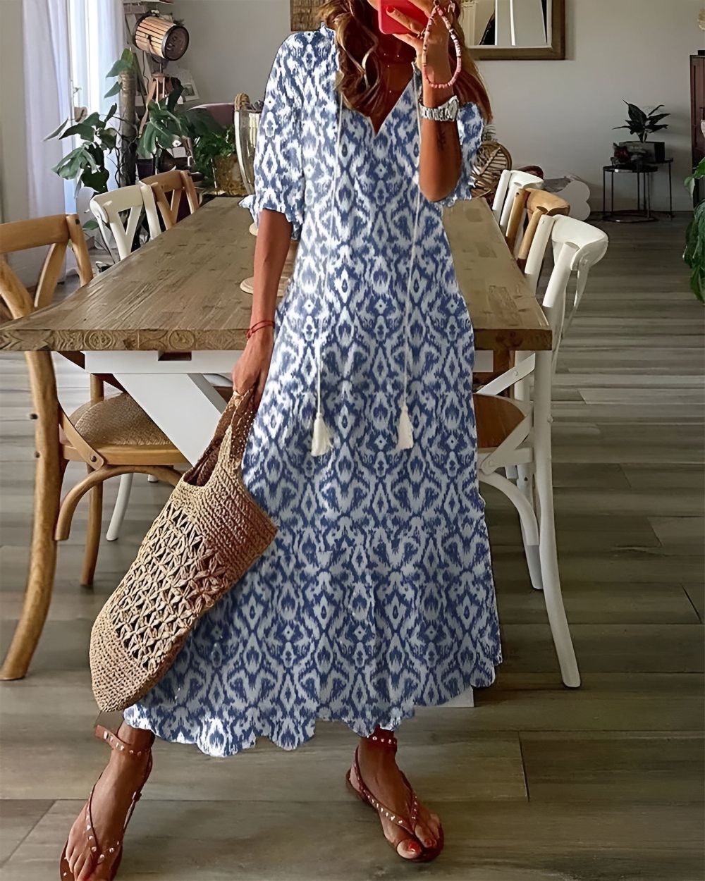 Women's blue and white ikat maxi dress with tassel tie detail, front view