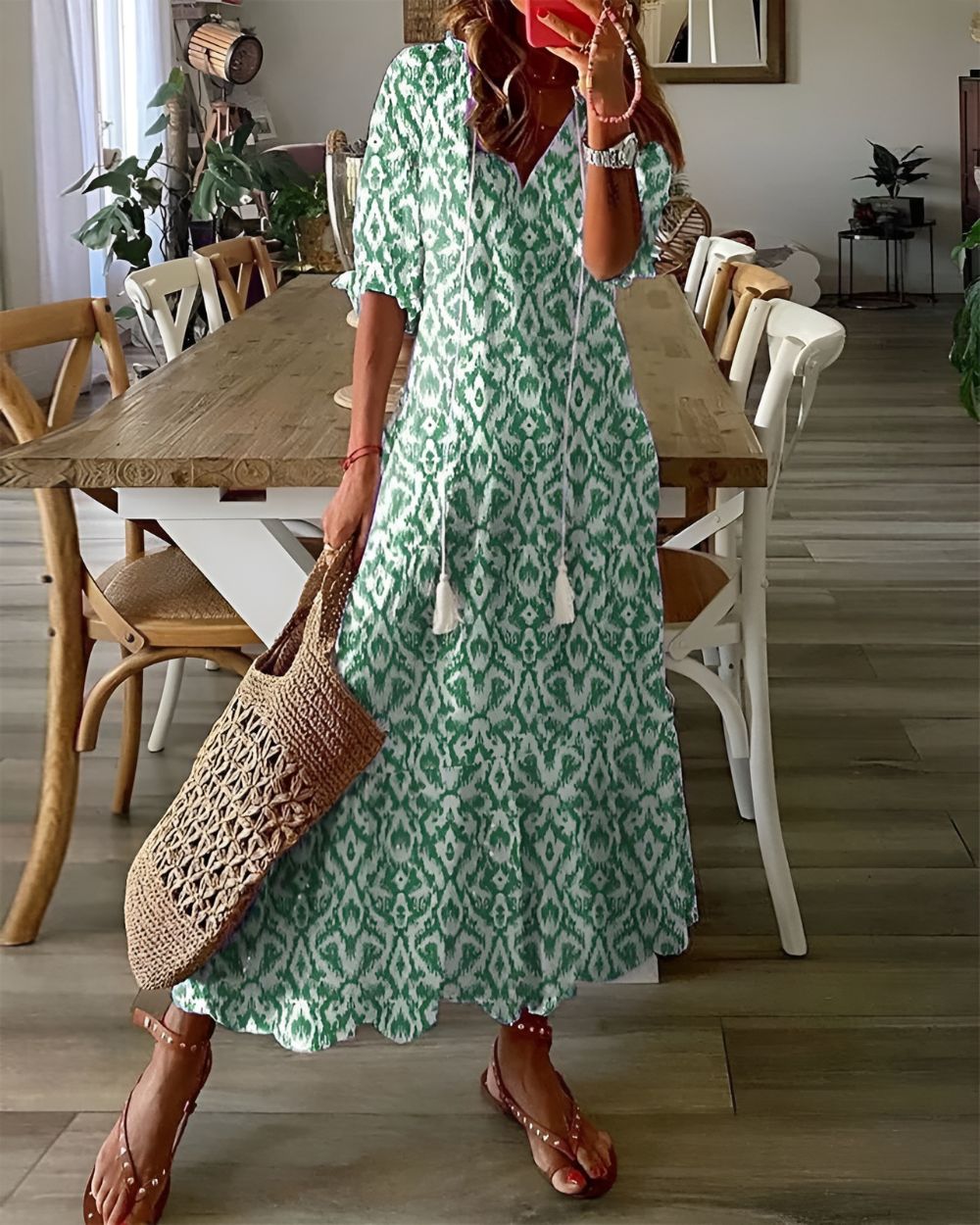 Model wearing ikat tassel tie maxi dress, standing pose showing full length