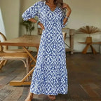 Close-up detail of blue and white ikat print pattern on dress fabric