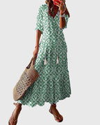 Model wearing ikat maxi dress standing in relaxed pose