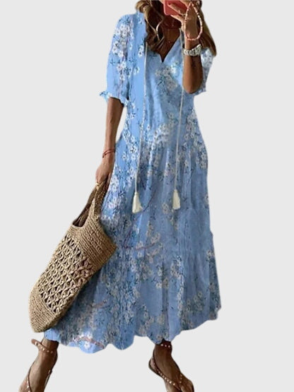Model wearing ikat dress in relaxed standing pose