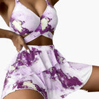 Model wearing marble bikini set and overlay, full-length pose