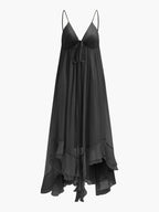 Walking pose showcasing floor-length hem and movement