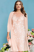 Full-length side profile of lace dress with coordinating jacket