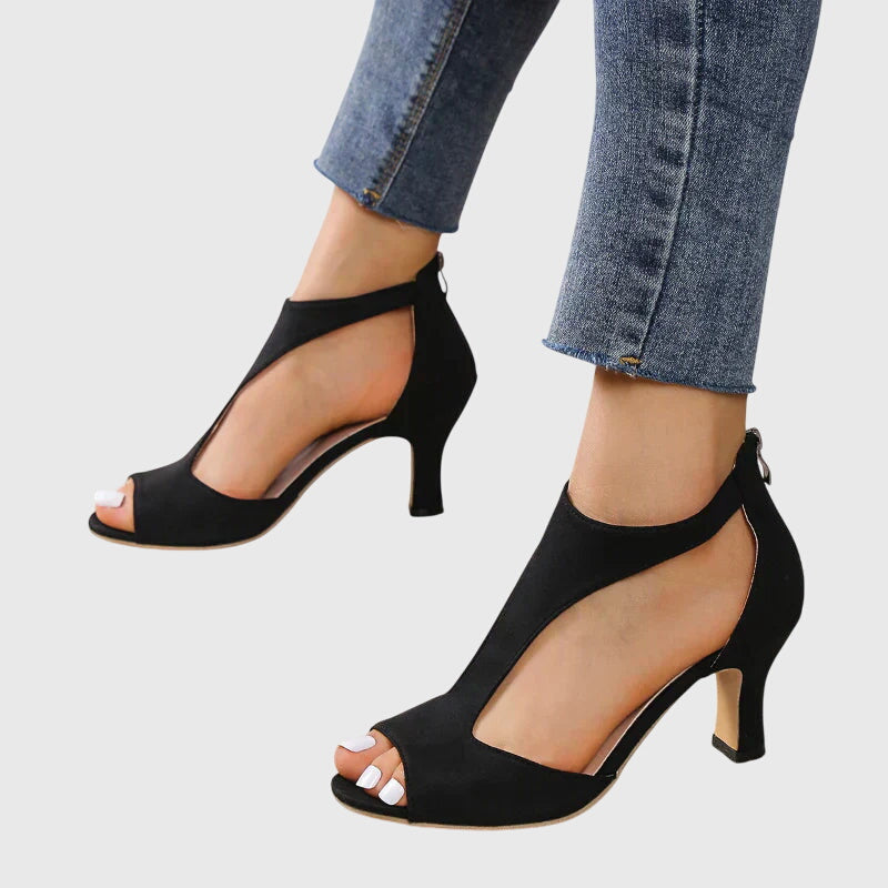 Peep toe sandal worn on foot, standing pose
