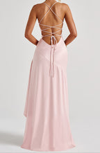 Model in dress, three-quarter pose showing overall silhouette
