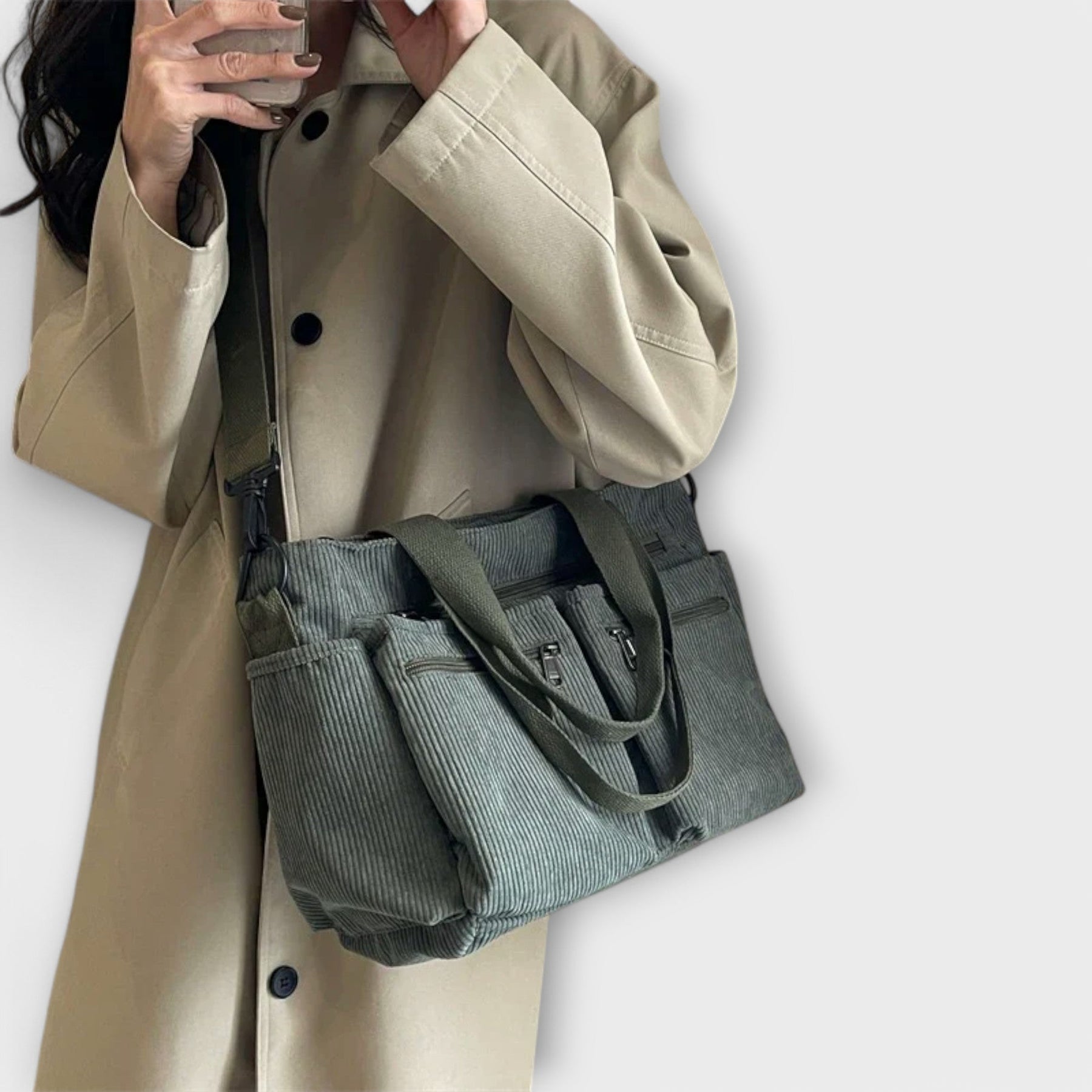 Corduroy tote bag worn crossbody from side angle