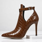 Front view of boot highlighting crocodile texture and pointed toe