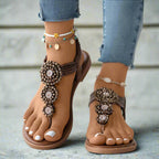 Women's embellished toe post sandal with beaded detail, displayed front view