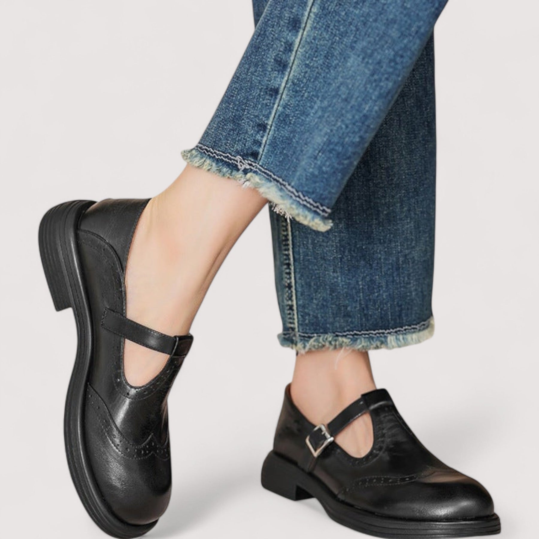 Woman wearing brogue Mary Jane sandals, standing pose