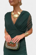 Model in casual standing pose wearing dress