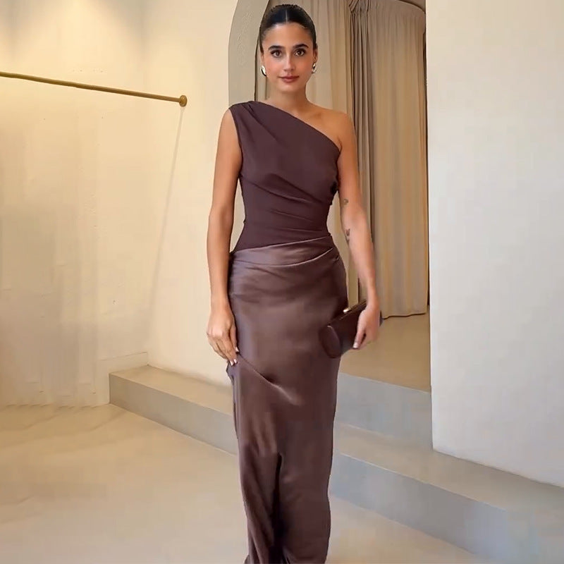 Model in maxi dress, three-quarter turn showing silhouette