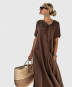 Women's brown maxi dress with tie neckline, front view