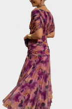 Model in off-shoulder dress, side profile pose