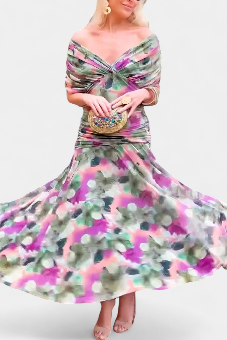 Model posing in ruched maxi dress, three-quarter angle