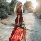 Burgundy lace maxi dress with empire waist, full-length front view