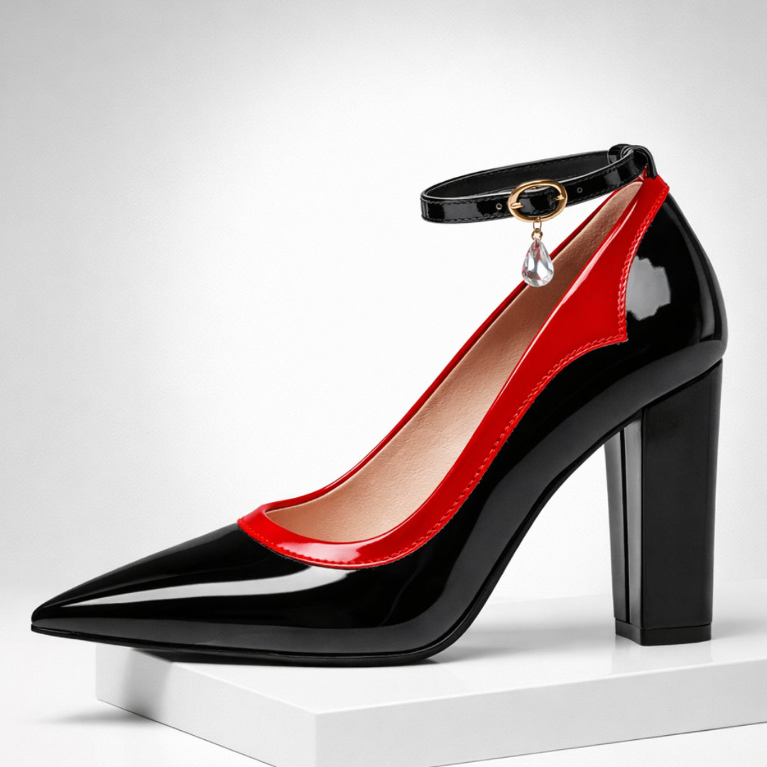 Front view of patent pump with ivory piping and crystal ankle charm