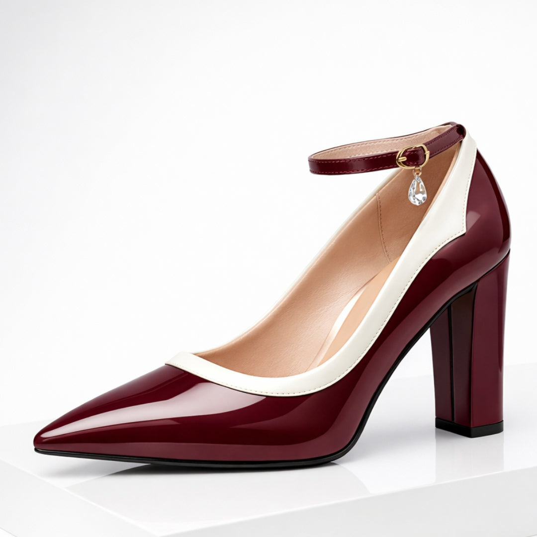 Patent leather ankle strap block heel pump, pointed toe, side view